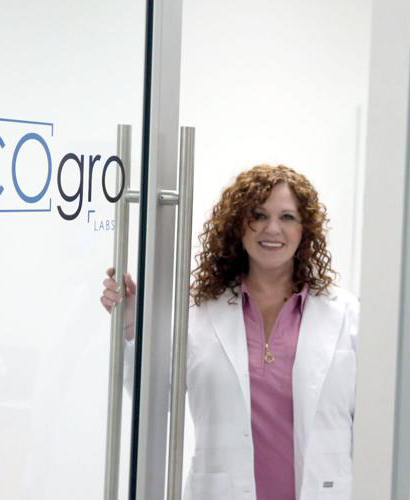 lab manager opening door